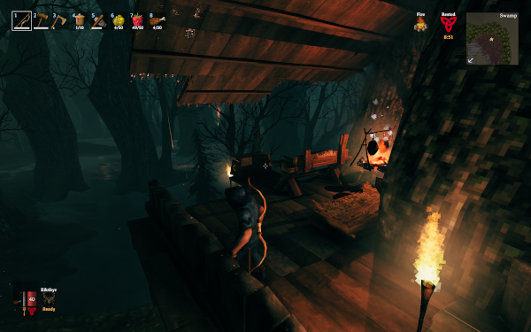 Player character standing inside a hastily built hut in the middle of a swamp.