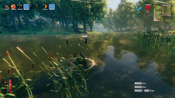 Player character swimming near a coast, with another players grave floating in the water.